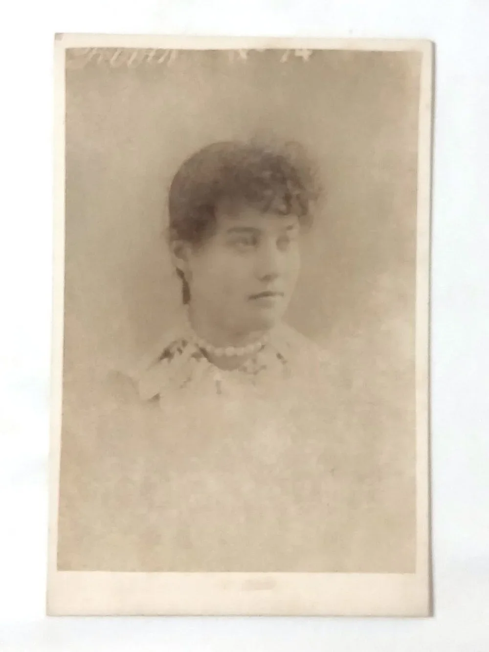 Antique Victorian Cabinet Card Young Woman Portrait Booth No. 74 c. 1890s